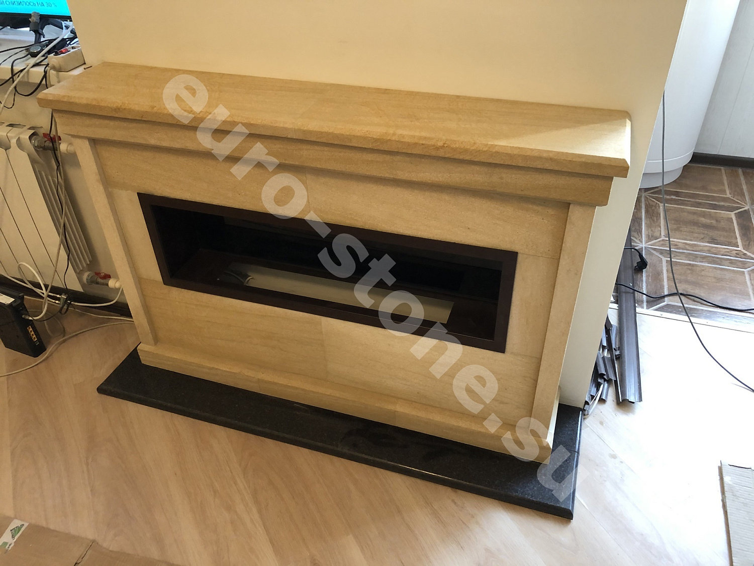 Облицовка камина песчаником